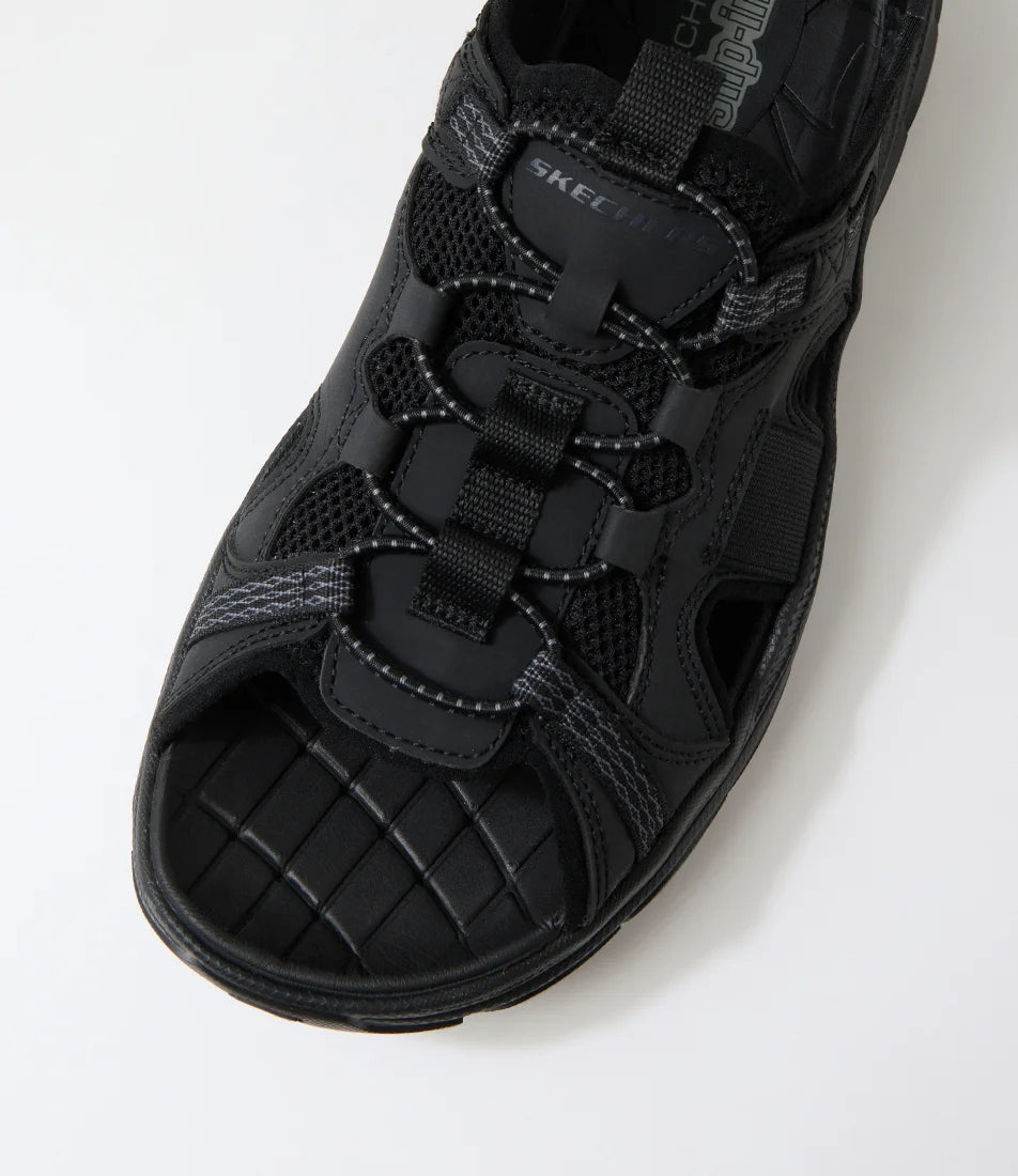 SKECHERS REVOLTED SLIP IN MERRICK - BLACK