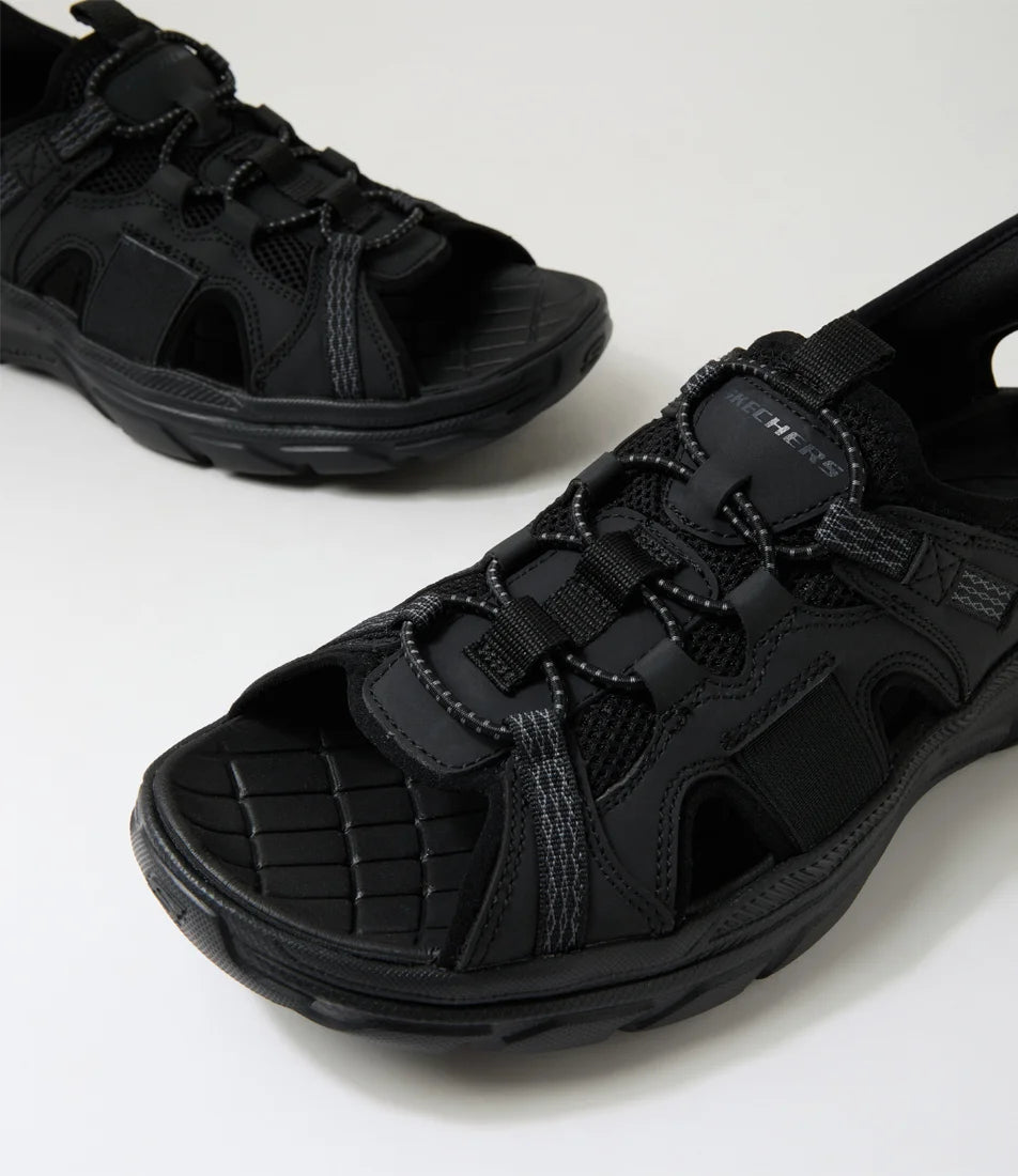 SKECHERS REVOLTED SLIP IN MERRICK - BLACK