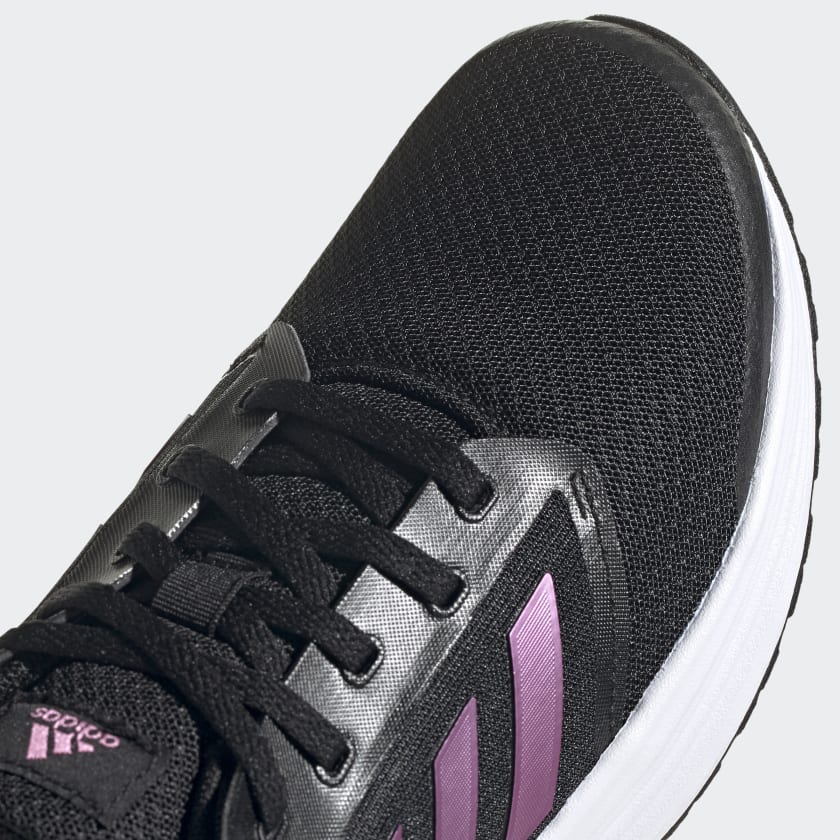 Black and pink store and gray adidas shoes