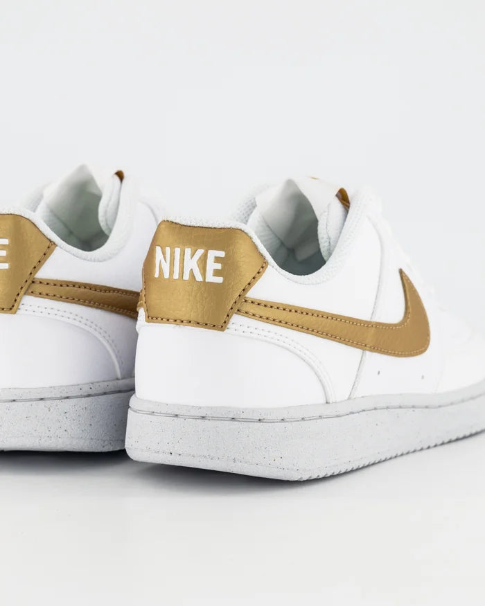 Nike white and top gold shoes womens